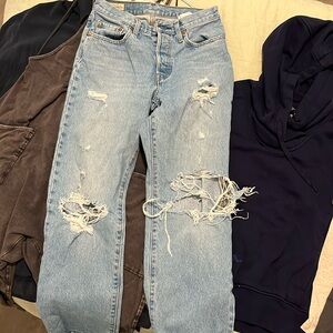 Levis 501 ripped light wash denim